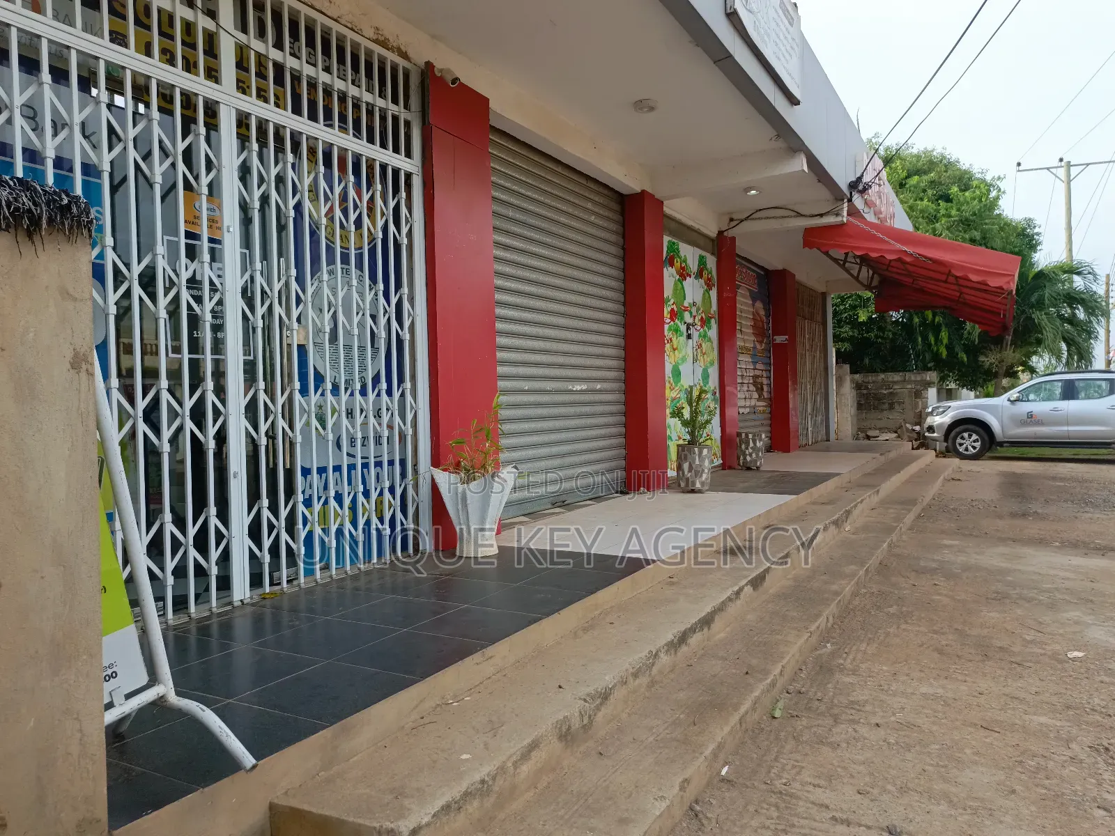 Shops for Sale in Haatso With 2 Half Plot