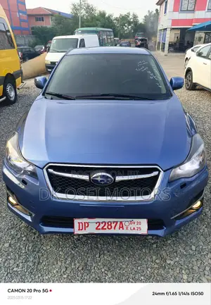 Subaru Impreza 2.0i Sport Premium PZEV 4dr Hatchback AWD (2.0L 4cyl 5M)