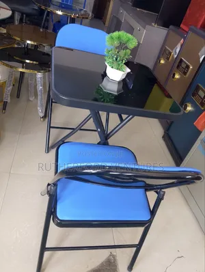 Foldable Table With Blue Chairs