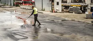 Ghana Man Cleaning With Cleantex
