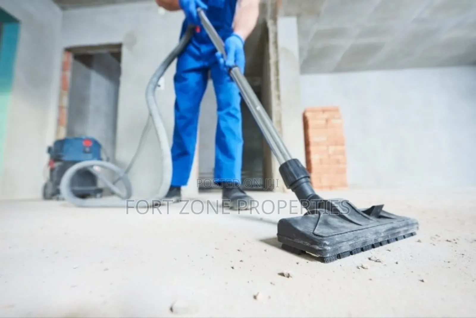 Ghana Man Cleaning With Cleantex