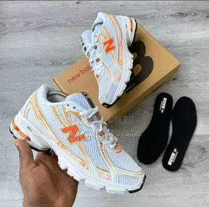 New Balance 740 Orange and White