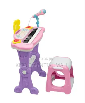 Keyboard or Piano With Stand and Chair