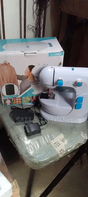 Mini Portable Handheld Sewing Machine