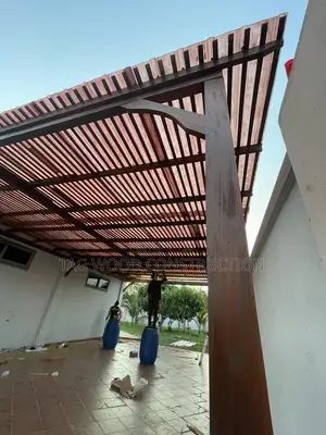 Pergola Attached to a War