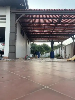 Pergola Attached to a War