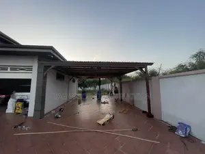 Pergola Attached to a War