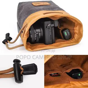  Mini Canvas and Leather Camera Bag at 210 Cedis
