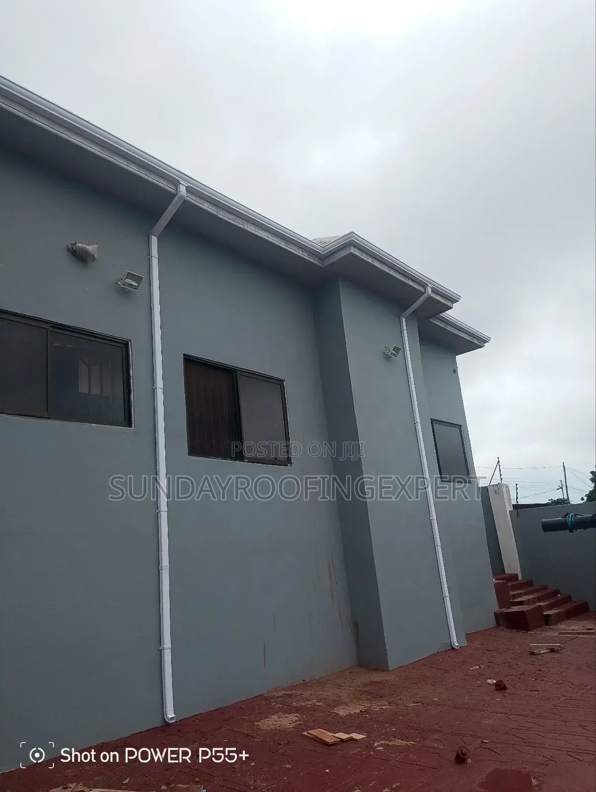 Gutter and Pipe Installation for Building
