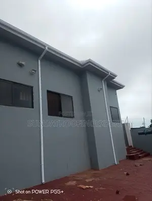 Gutter and Pipe Installation for Building