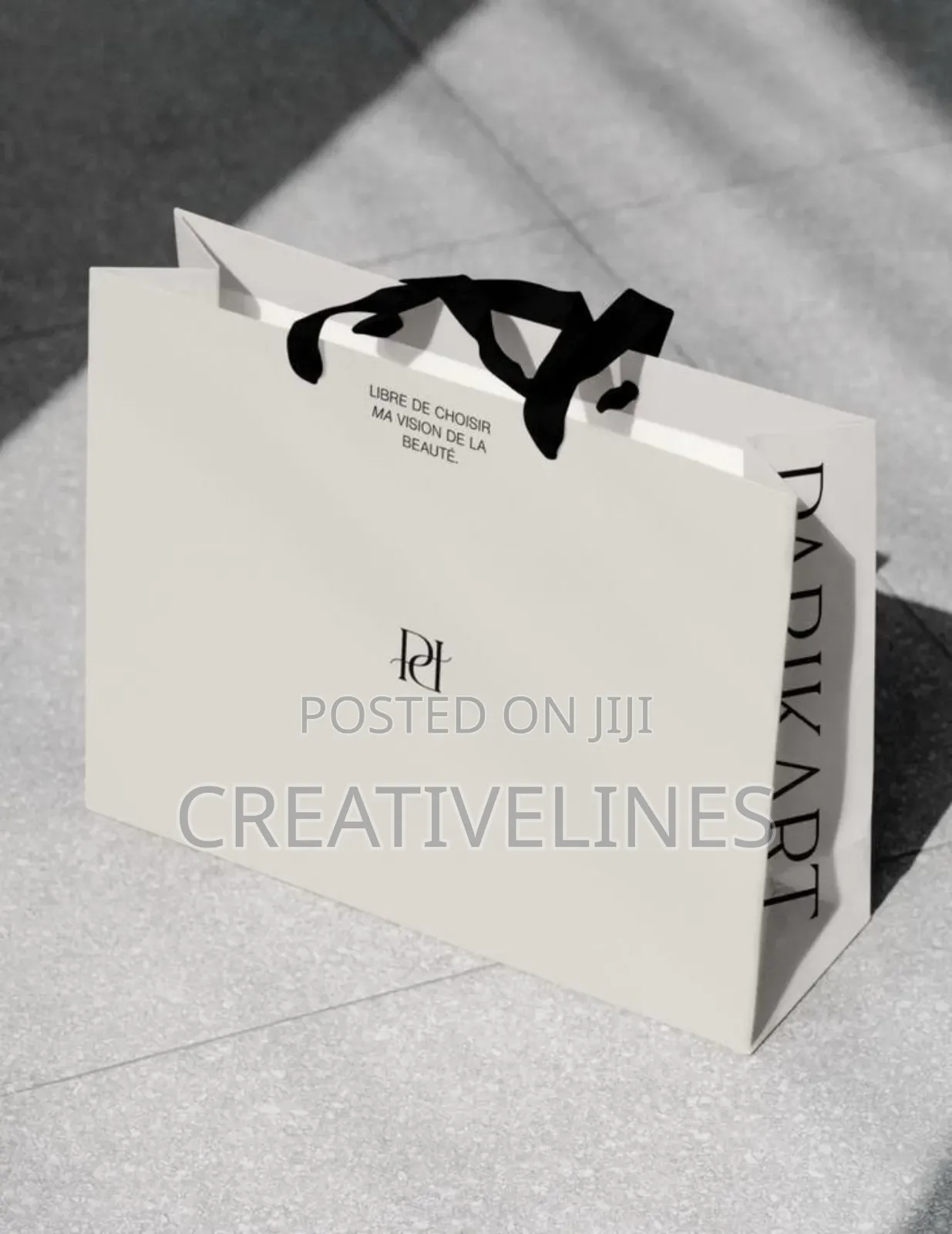 White and Black Paper Bag