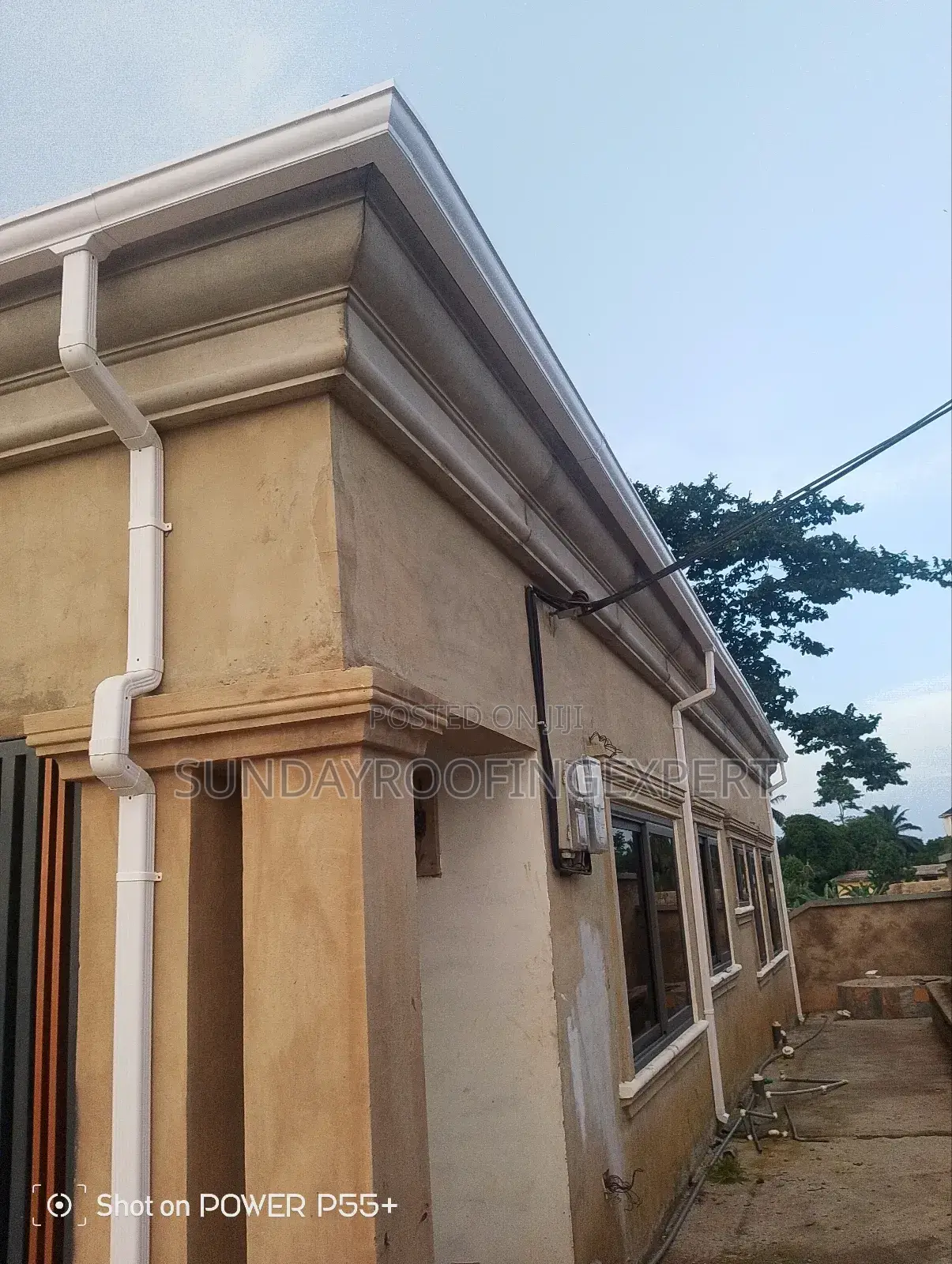 Installed Rain Gutter and Pipe