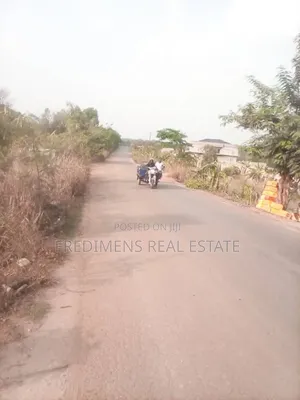 Land on Main Road at Aputuogya for Sale
