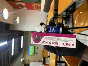 Scalp Roller + Minoxidil Oil Barrier
