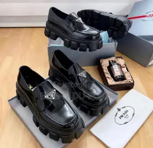 Prada Monolith Leather Loafers.