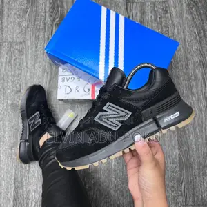 New Balance Unisex Encap Reveal “ Core Black”