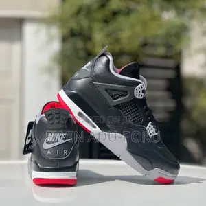 Air Jordan 4 "Bred Reimagined" Sneakers.