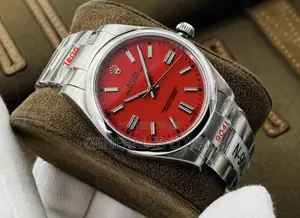 Rolex Oyster Perpetual Watch Red Dial.