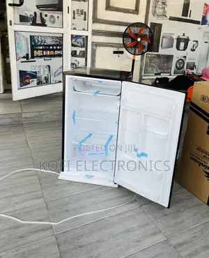 Extremely Chilling Rainbow Single Door Table Top Fridge.