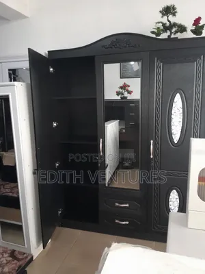 Black Wardrobe With Mirror in the Middle