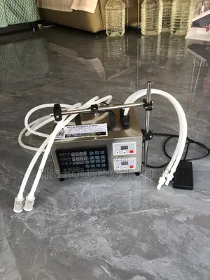 Double Nozzle Liquid Filling Machine
