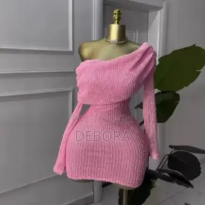 Bodycon Mini Dress With an Off-Shoulder Neckline and Long Sleeves.