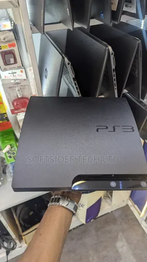 A Black Playstation 3 Slim With Games for Sale in Accra