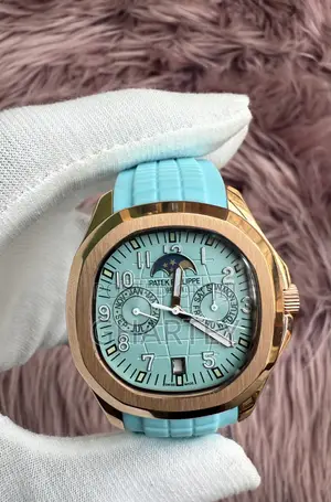 Patek Philippe Aquanaut Rose Gold Tiffany Blue Dial Strap Moonphase