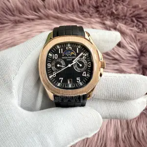 Patek Philippe Aquanaut Rose Gold With Black Dial Strap – Moonphase