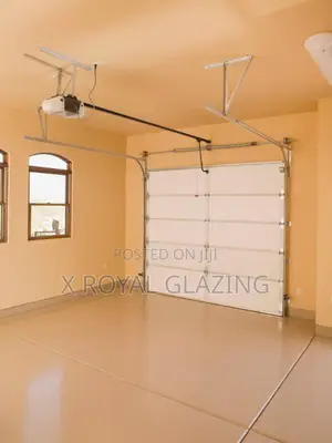 White Modern Remote Control Garage Door Well Installed