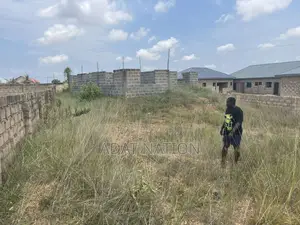 Uncompleted Structure on a 72 by 99 Plot of Land