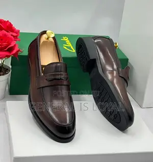 Clarks Men's Brown Leather Penny Loafers.