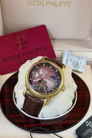 Patek Philippe Automatic Watch With A Brown Leather Strap