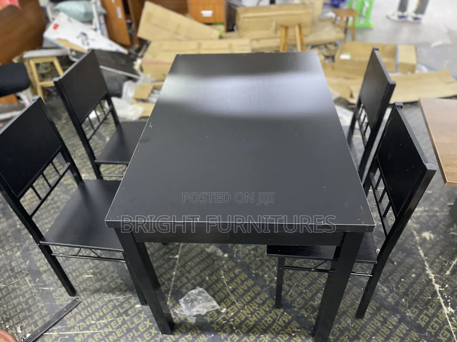 Table With 4 Seats ( Wooden and Black in Color)