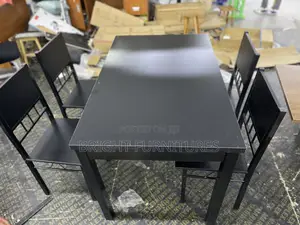 Table With 4 Seats ( Wooden and Black in Color)