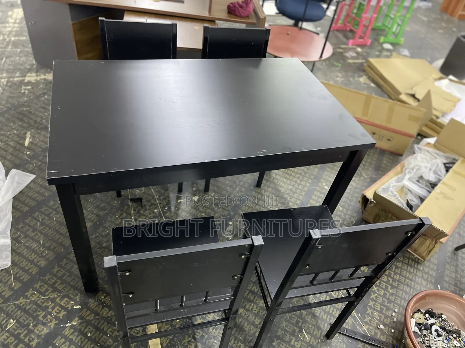 Table With 4 Seats ( Wooden and Black in Color)