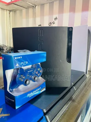 Playstation 3 Slim Durable Complete With Games on It and a Controller
