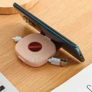 Retractable Cable Winder With Integrated Phone Stand