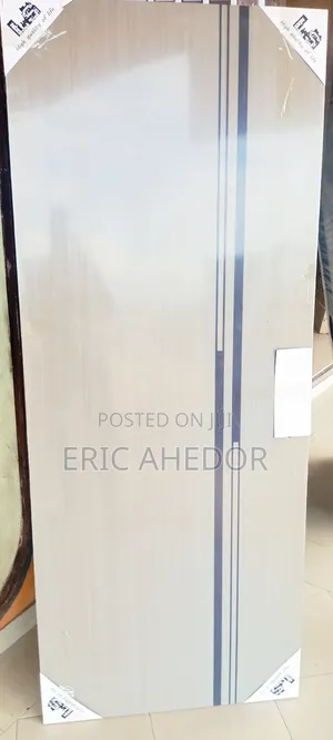 Smooth Wooden Door With Metal Frame and Handle