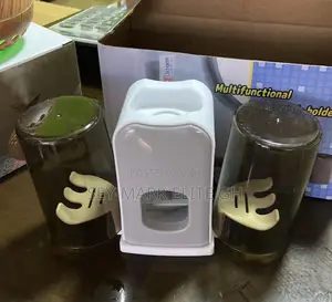 Automatic Toothpaste Dispenser And Brush Holder
