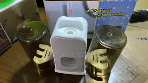 Automatic Toothpaste Dispenser And Brush Holder