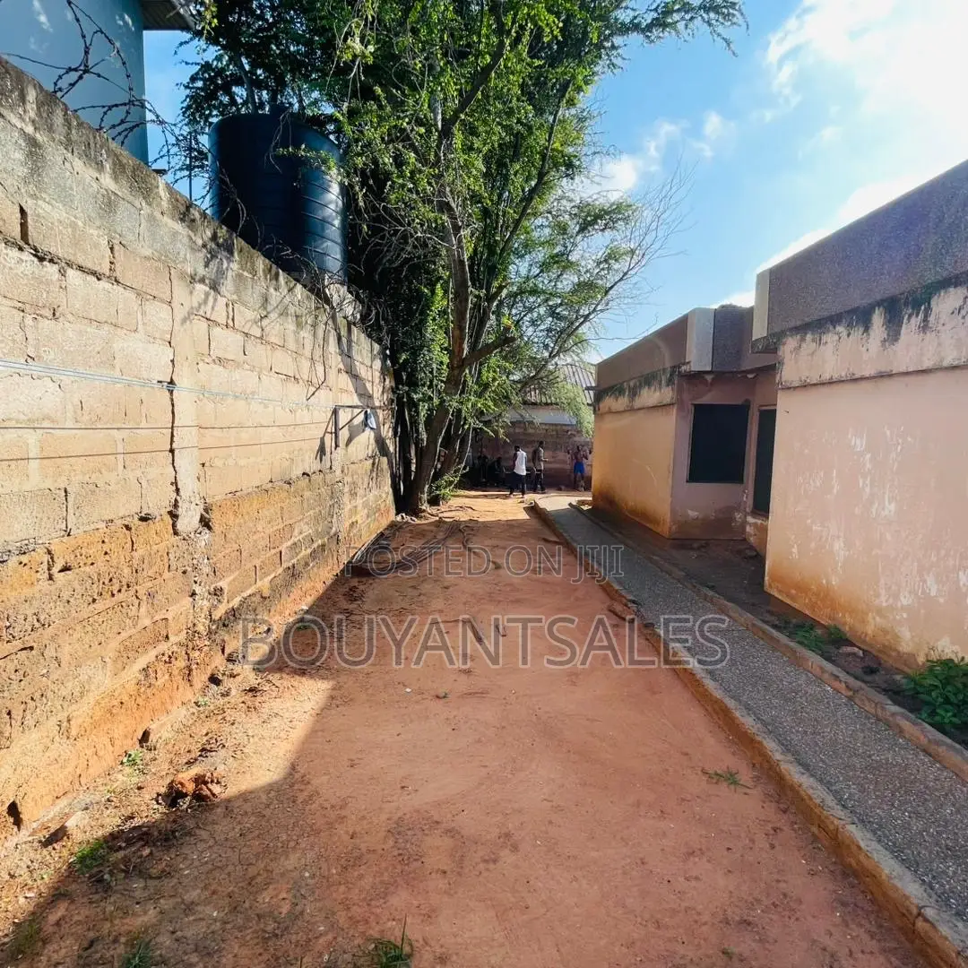 Titled 3 Plots of Land for Sale at Mile 7, on the Main Road.