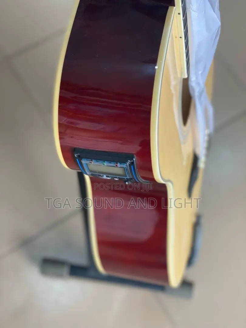 Yamaha Dreadnought Cutaway Semi-Acoustic Guitar.