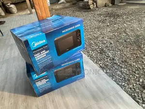 The Culinary Conductor of Swift Feasts Midea Microwave