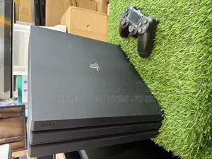 Playstation 4 Pro Console Display With One Controller and One Cd