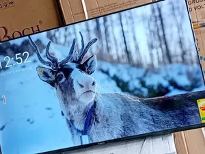 Full-Featured 55-Inch Smart Uhd Tv With Wi-Fi, Bluetooth, and Multiple
