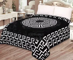 Quality Korean Mink Blanket With a Blue and White Greek Key Pattern.