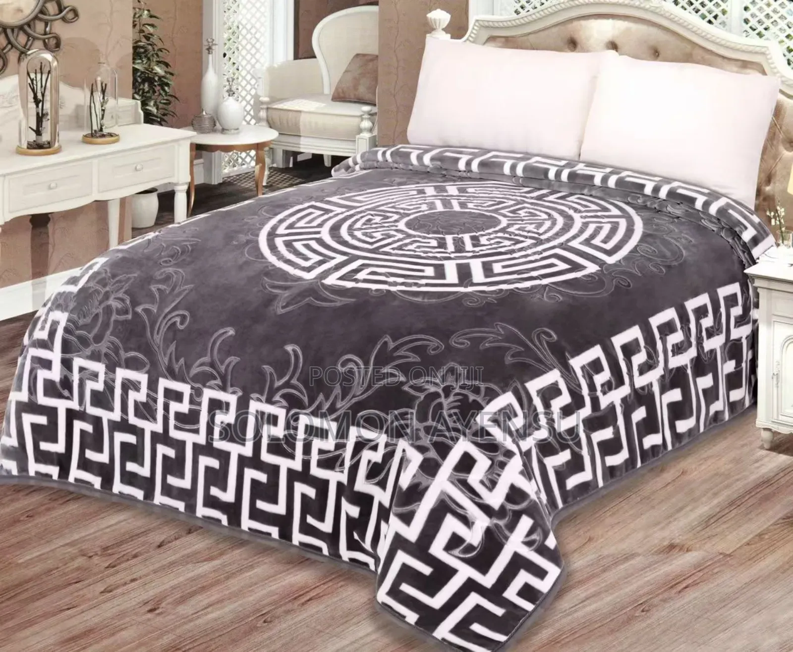 Quality Korean Mink Blanket With a Blue and White Greek Key Pattern.