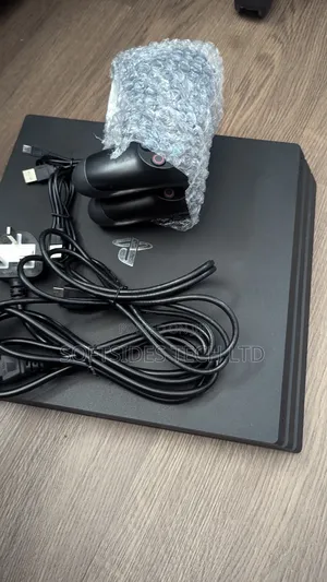 Playstation 4 Pro With Two(2) Controllers And 17 Games Promo!!