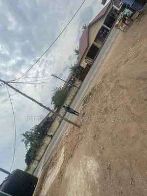 Prime School Complex on 8 Plots – Amasaman Cocobod Main Road for Sale.